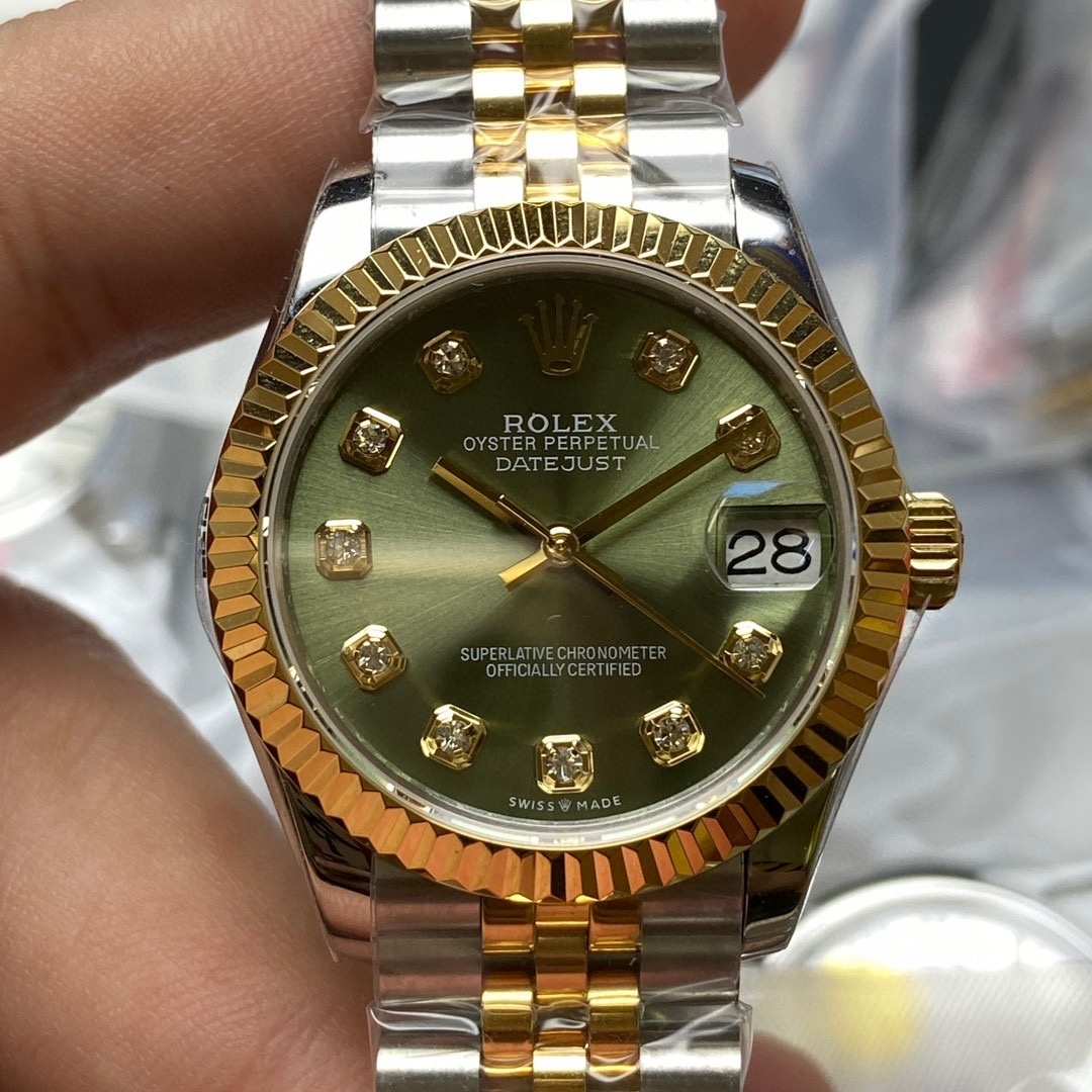 Rolex Datejust 31 watch: Oystersteel and yellow gold .