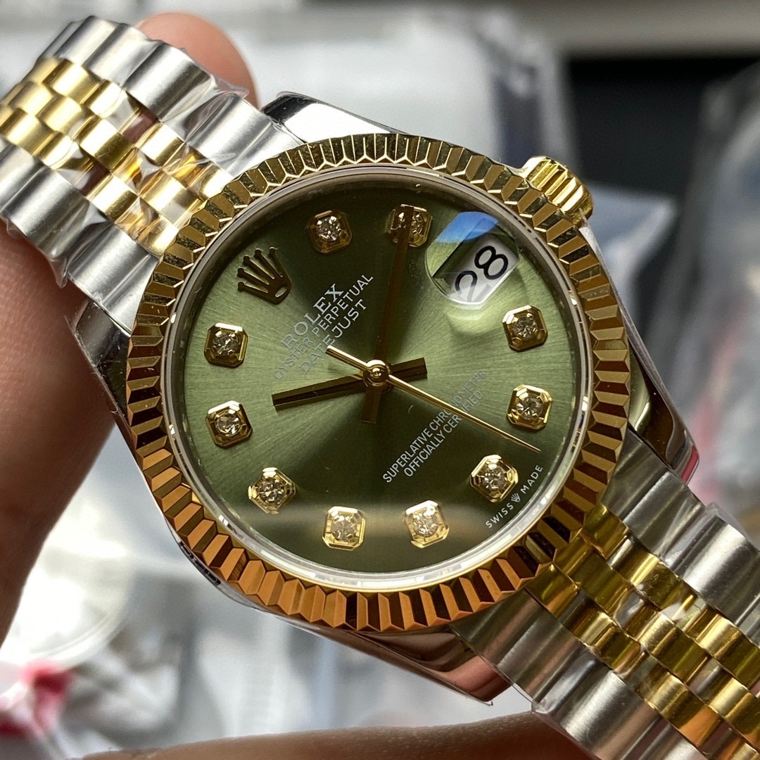 Rolex Datejust 31 watch: Oystersteel and yellow gold .