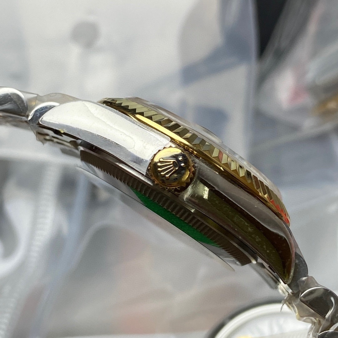 Rolex Datejust 31 watch: Oystersteel and yellow gold .