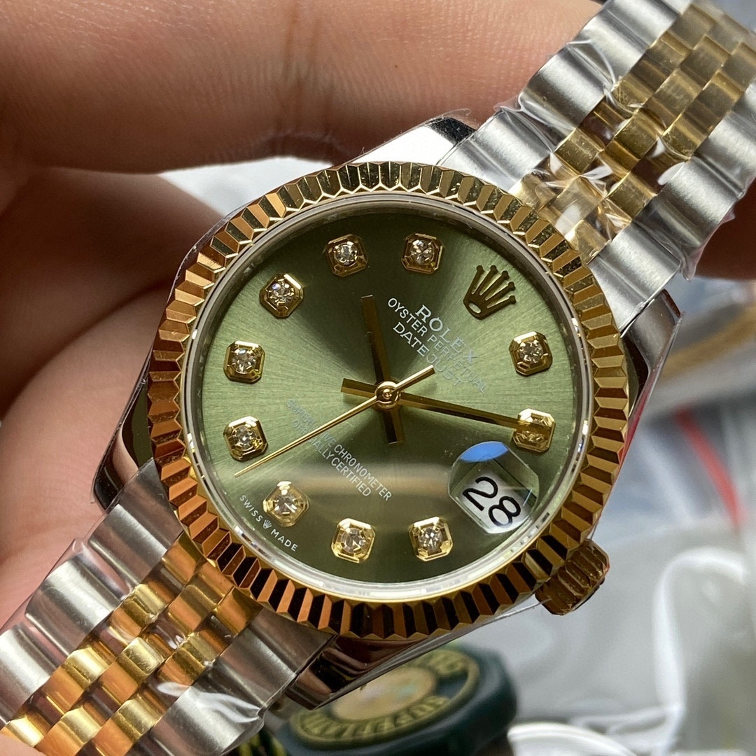 Rolex Datejust 31 watch: Oystersteel and yellow gold .