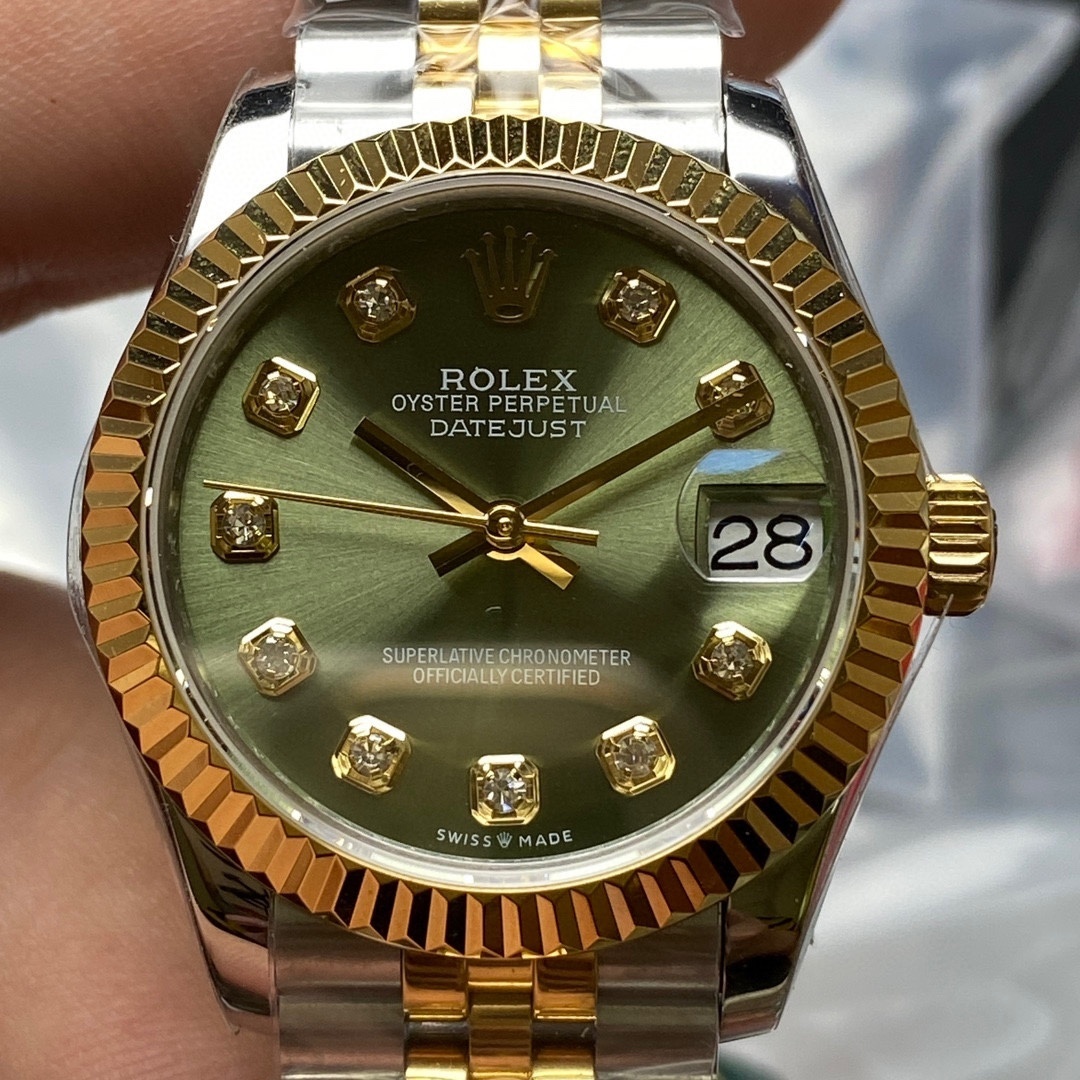 Rolex Datejust 31 watch: Oystersteel and yellow gold .