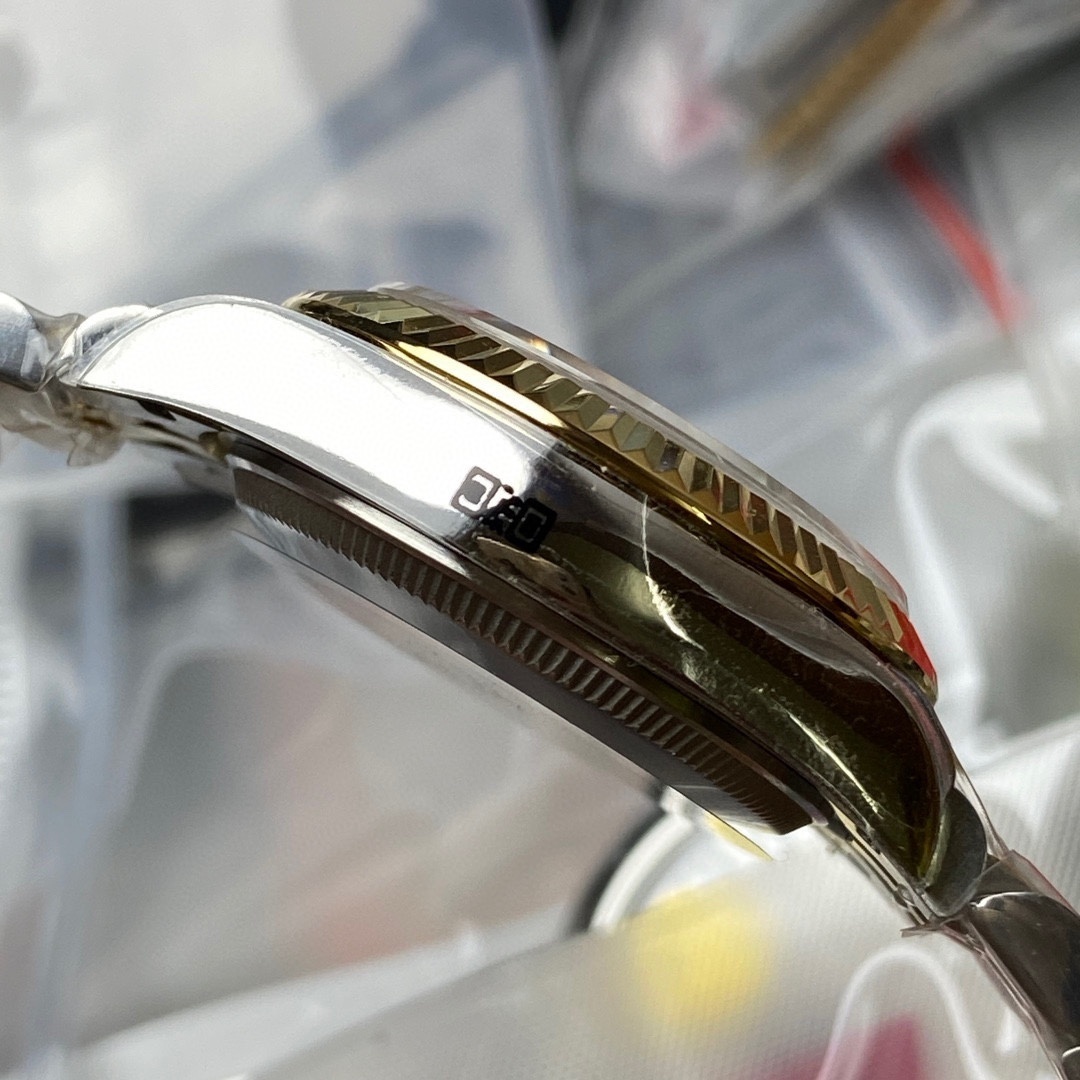 Rolex Datejust 31 watch: Oystersteel and yellow gold .