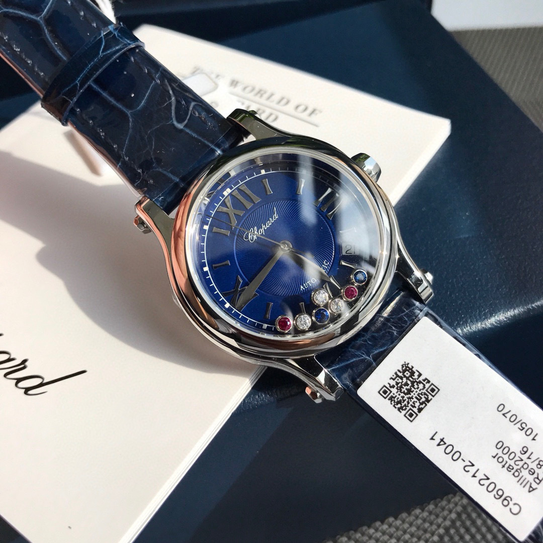 Chopard Happy Sport R. 8347 Stainless Steel, Natural Ruby Yellow & Blue Sapphire