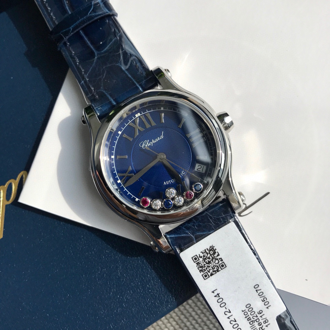 Chopard Happy Sport R. 8347 Stainless Steel, Natural Ruby Yellow & Blue Sapphire