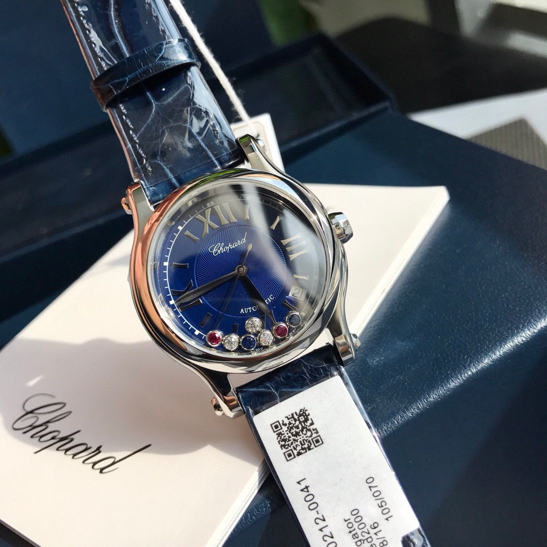 Chopard Happy Sport R. 8347 Stainless Steel, Natural Ruby Yellow & Blue Sapphire