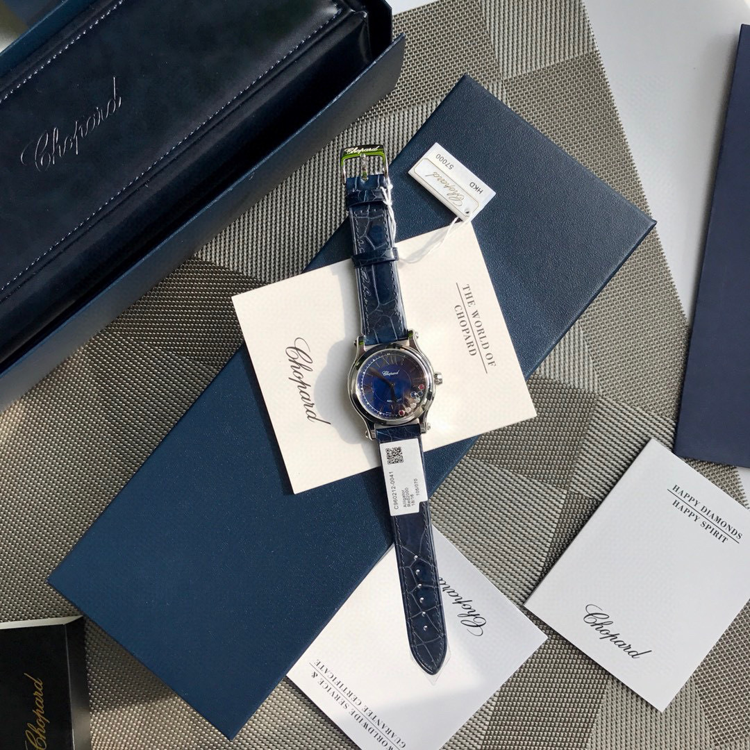 Chopard Happy Sport R. 8347 Stainless Steel, Natural Ruby Yellow & Blue Sapphire